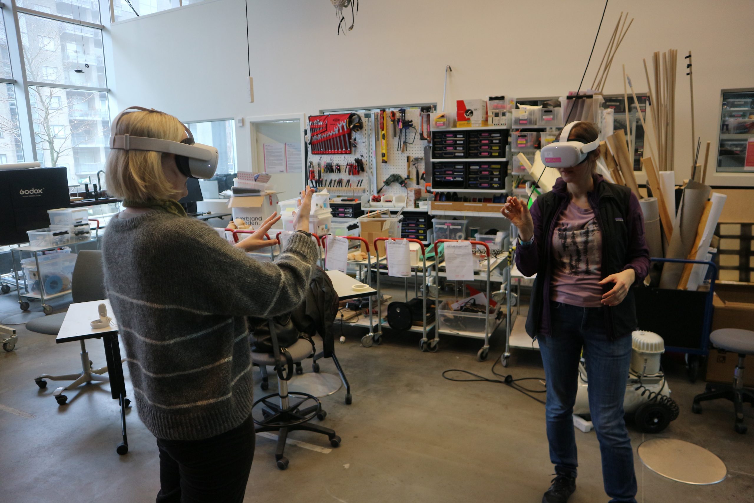 2 persons using VR in AIR lab, Research workshop on somaesthetic design.