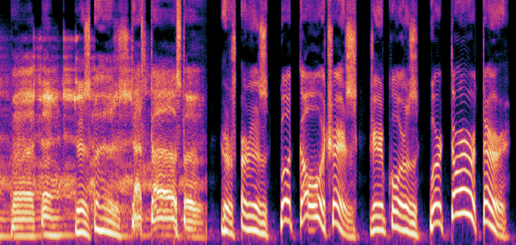 A spectrogram. It has orange and purple colors on a black background.